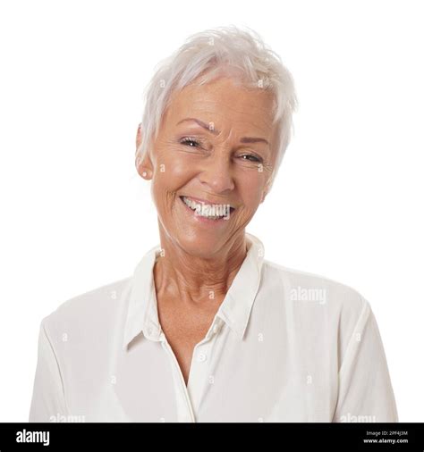 Happy Smiling Older Lady In Her Sixties With Trendy White Short Haircut