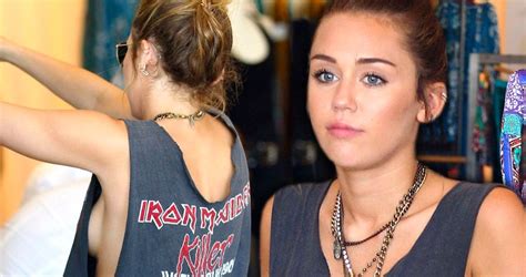 Daring Rock Chick Miley Cyrus Wears Gaping Iron Maiden T Shirt And No