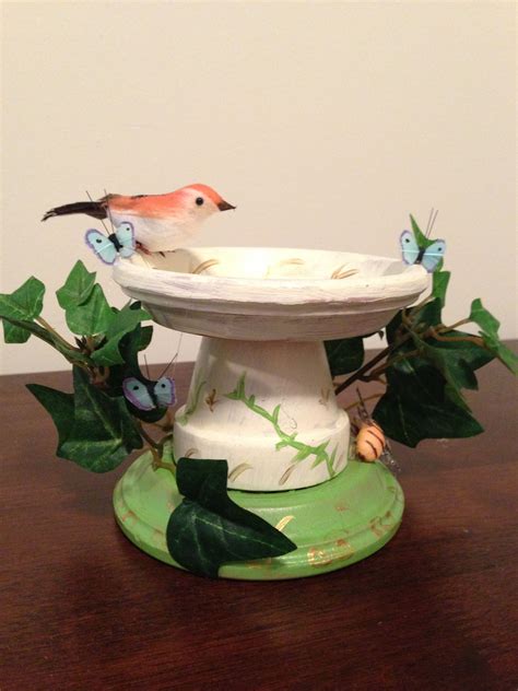 Little Birdbath Made Out Of A Clay Pot And Two Clay