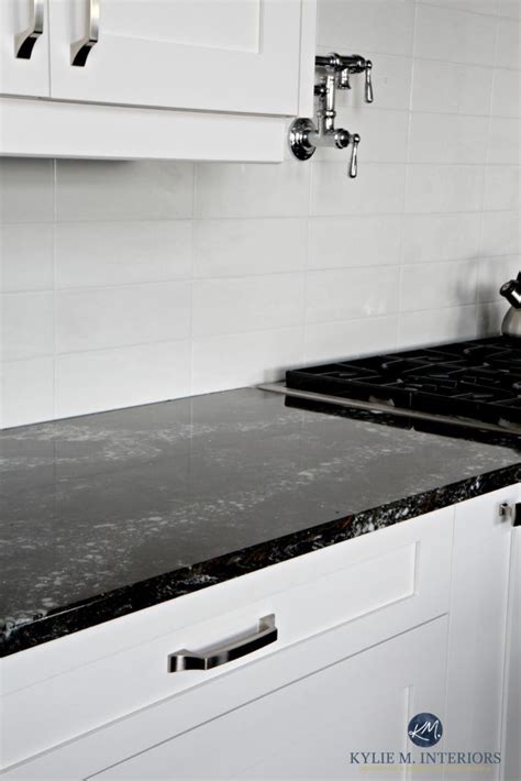 Take your rental kitchen from drab to fab by installing a fake backsplash! black quartz countertop high gloss cabinets - Google ...