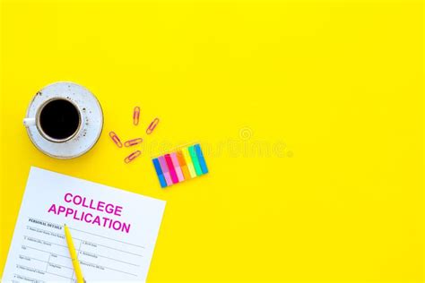 Apply College Empty College Application Form Near Coffee Cup And Stationery On Yellow