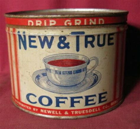 An Old Tin Can With Coffee On The Inside And New And True Coffee In It
