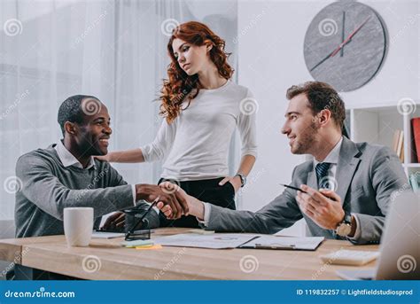 Interracial Couple In Office Of Stock Image Image Of American Cooperation 119832257