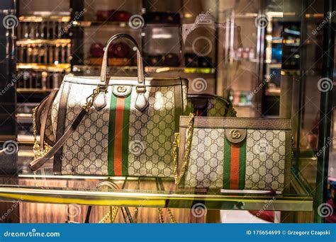 Gucci Fashion Store Window Shop Bags On Display For Sale Exposition