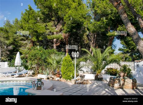 Classic Spanish Villa In Moraira With A Pool Set In A Mediterranean Mature Garden Spain Stock