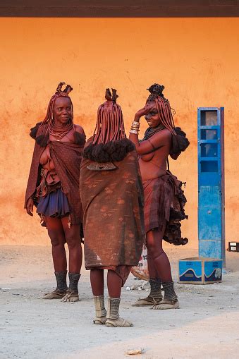 Opuwo Namibia Himba Women With The Typical Necklace And Hairstyle In