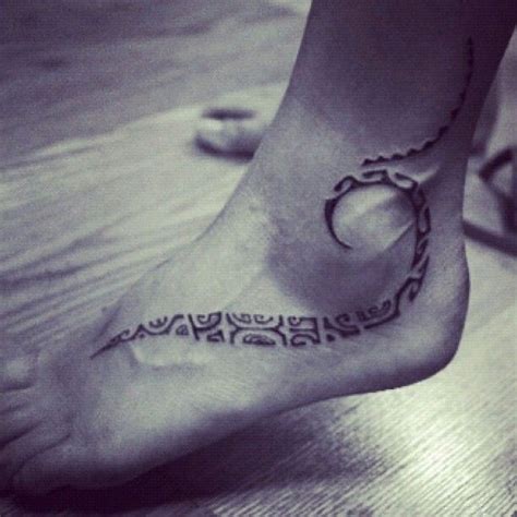 These kinds of ankle band tattoos will mimic most closely the abundant history of what arm bands have been and still are. Tribal foot tattoo | Tribal foot tattoos, Foot tattoos ...