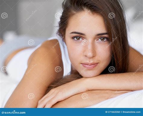 Giving My Body All The Rest It Needs Portrait Of A Beautiful Young Woman Lying In Bed Stock