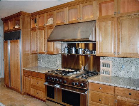 Glass cabinet doors can be a beautiful component of kitchen cabinetry. Kitchen | Oakridge Cabinets
