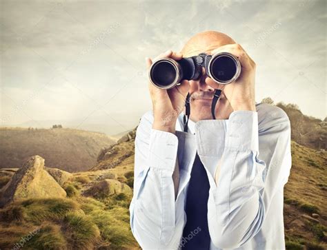 Businessman Looking Through A Binoculars — Stock Photo © Olly18 30042087