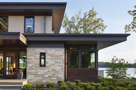 Wood siding is the oldest siding in the u.s. Modern home with Exterior, Stone Siding Material, Wood ...