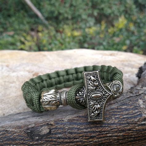 Handcrafted paracord bracelet utilizing authentic usa 550 paracord. Navy Green Paracord Bracelet Norse Viking Runes Beads Braided Bracelet Men Bracelets Thor Hammer ...