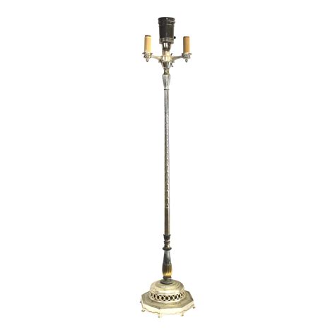 Floor lamps come in a range of different styles. Colonial Premier Floor Lamp | Chairish