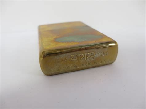 This is in lightly used but very good condition. Value of 1932-1992 ZIPPO 60TH ANNIVERSARY Brass Laser ...