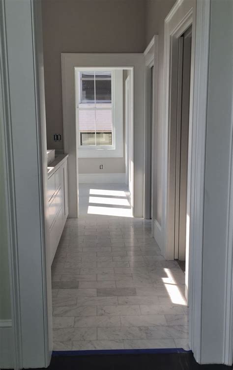 I wanted it to be completely carrara marble but of course that is extremely expensive and it doesn't. 6x12 Carrara marble Master Bathroom floor. | Tile bathroom ...