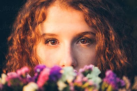Ginger Haired Woman Holding Flowers By Stocksy Contributor Lumina Stocksy