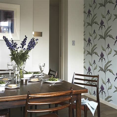 We mounted small pots of hot pink cyclamen onto little plinths on a wall as a dramatic display for a hall or dining room. Retro dining room with feature wallpaper | Decorating ...