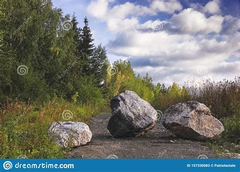 Large Boulder Stones Block The Forest Road Summer Landscape Stock Image