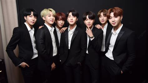 The Bts Band Are In Suits And Posing For A Picture Background Bts