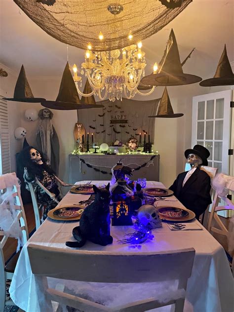 How To Create A Haunted Mansion Halloween Party On A Budget Sarah
