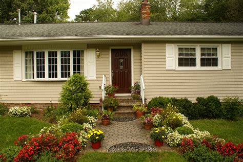 Traditional ranch style homes used to have a dull exterior owing to the monochromatic color theme followed, and the common brick and wood pattern. Ranch Style Home - Design Build Planners