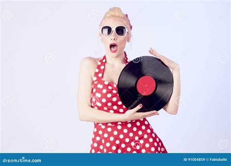 pin up girl in vintage dress holding a vinyl records stock image image of fashionable