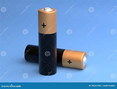 Two Aa Size Batteries Isolated On Blue Background Close Up Carbon Zinc