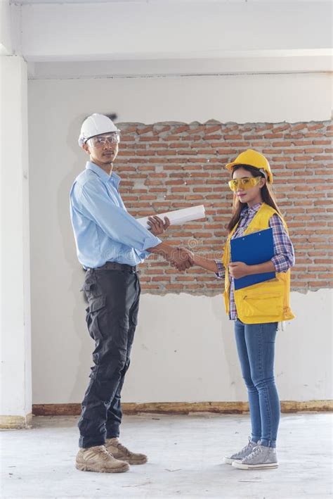Civil Construction Engineer Teams Shaking Hands Together Wear Work