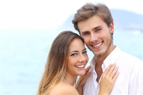 Happy Couple With A White Smile Looking At Camera Stock Image Image