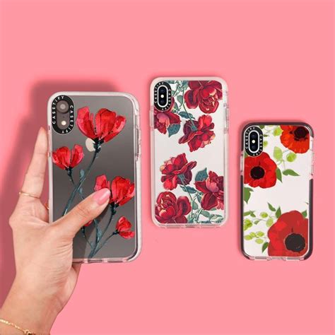Three Cases With Red Flowers On Them