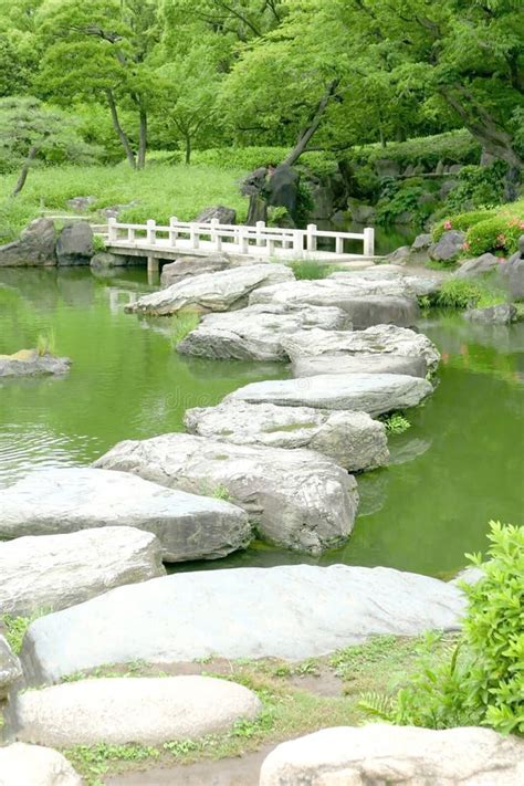 Stone Bridge And Water Pond In Japanese Zen Garden Stock Photo Image