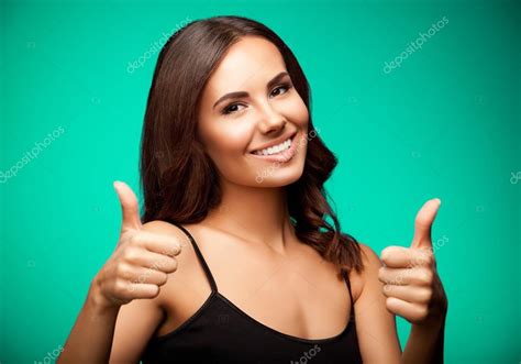 Portrait Of Woman Showing Thumb Up Gesture On Green Stock Photo G Studio