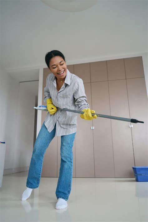 african american woman has fun cleaning the house stock image image of chores equipment