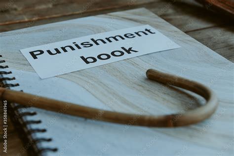 Punishment Book Rattan Cane For Spanking On Headmasters Or Teachers Desk School Corporal