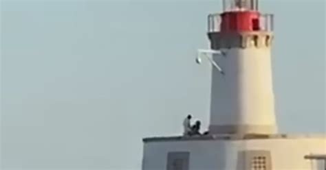 Shocking Moment Couple Romp On Ibiza Lighthouse In Front Of Passing Tourist Boat Daily Star