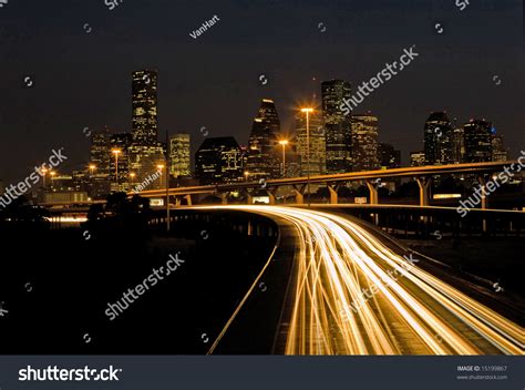 Traffic On Highway Exiting The City Of Houston At Night