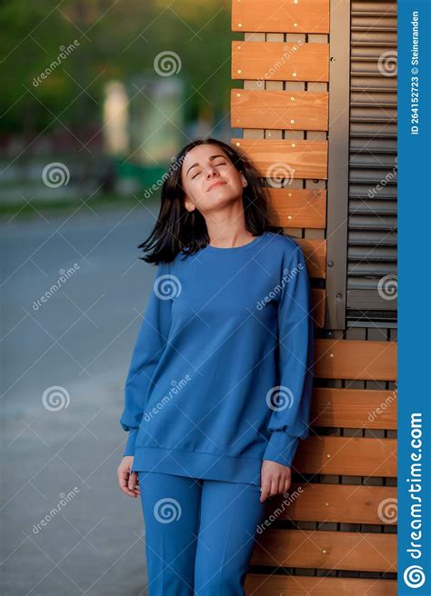 Dark Haired Girl Walks Around The City And Posing In A Blue Suit Stock Image Image Of Elegance