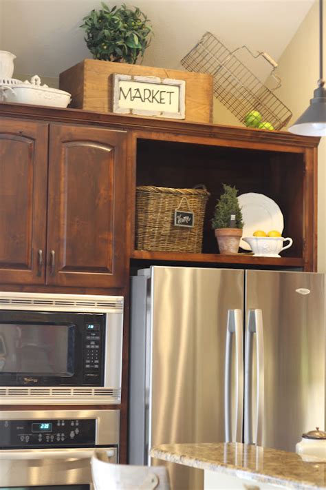 10 ideas for decorating above kitchen cabinets not sure what to do. A Thrifted Market: Wasted Space