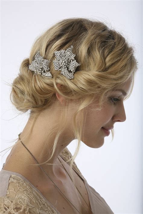 Tight updo with a jewel. Vintage & Lace Weddings: Vintage Wedding Hair Styles