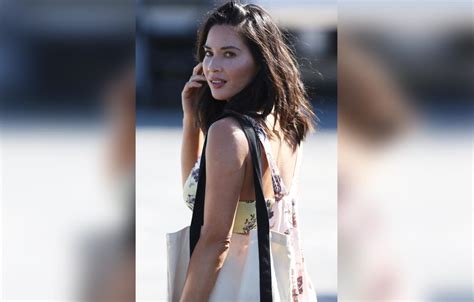 Olivia Munn Shows Off Sexy Cleavage As Aaron Flaunts New Girlfriend