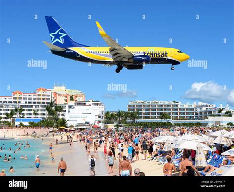 Air Transat Boeing Landing I St Maarten Airport Passing Over The Airport Beach Tourist