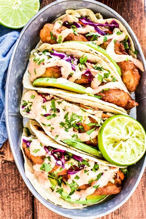 Overhead Shot Of Baja Fish Tacos In A Serving Tin With Avocado Fresh