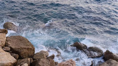 Ocean Waves Crashing And Flowing On The Coastline Rocks Nature Footage