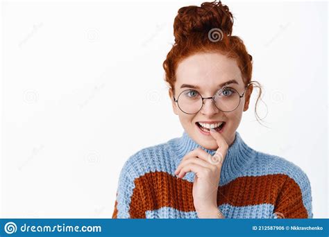 Close Up Portrait Of Excited Redhead Girl In Glasses Listening To