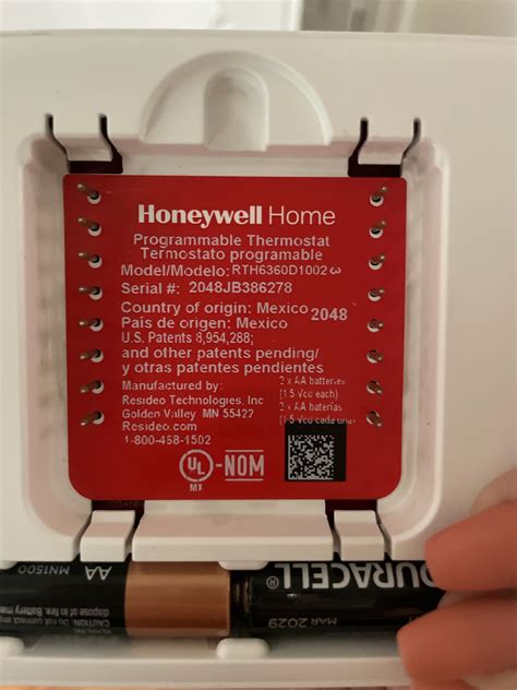 My thermostat is showing a symbol of a triangle with an exclamation