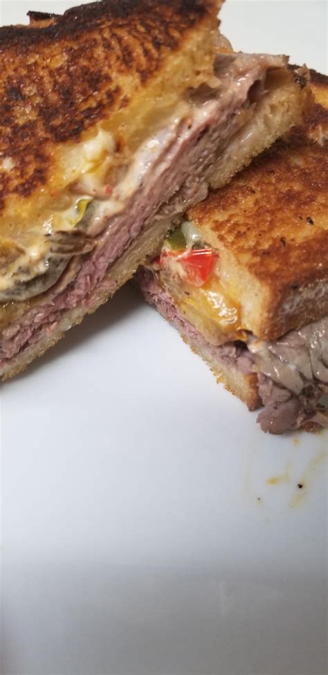 Philly Steak Grilled Cheese With Sourdough Bread And Roasted Red Bell