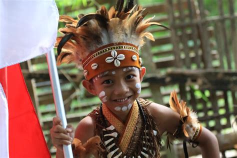 Premium Photo Asian Children Wearing Papua Traditional Clothes And