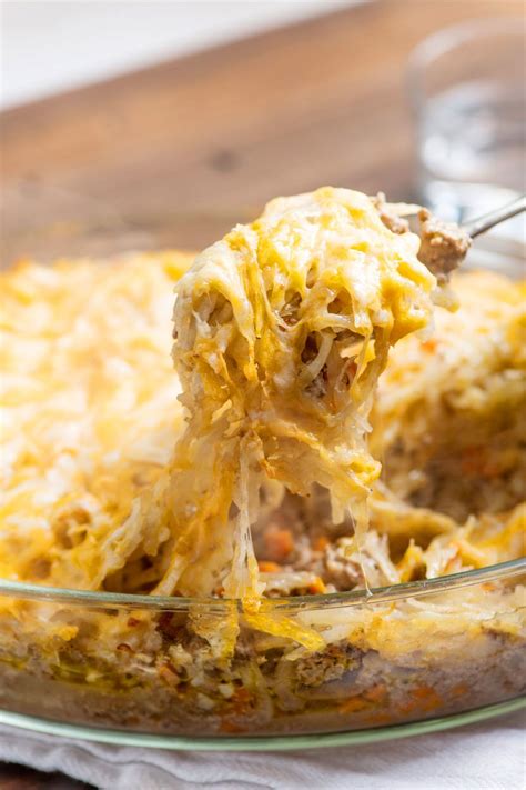 Add to the sour cream, 1 1/2 ounces shredded cheddar, salt, and pepper. Cheesy Beef and Hash Brown Casserole / Crispy but tender ...