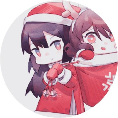 Two Anime Girls Wearing Santa Hats And Holding Something In One Hand