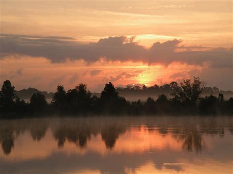 Layers Of Sunrise Over Alligator Lake Photograph By Roy Erickson Pixels